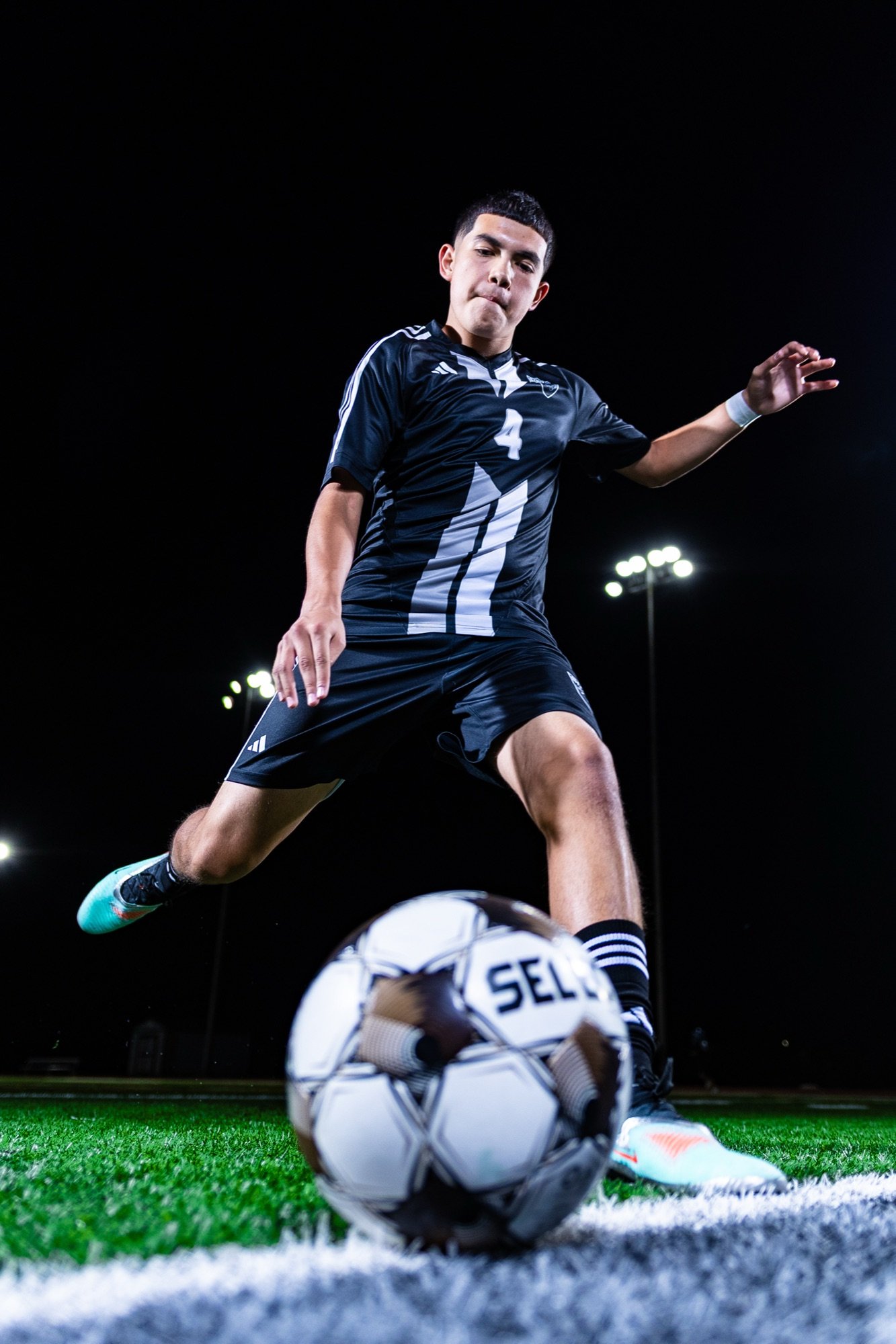 Soccer player at night